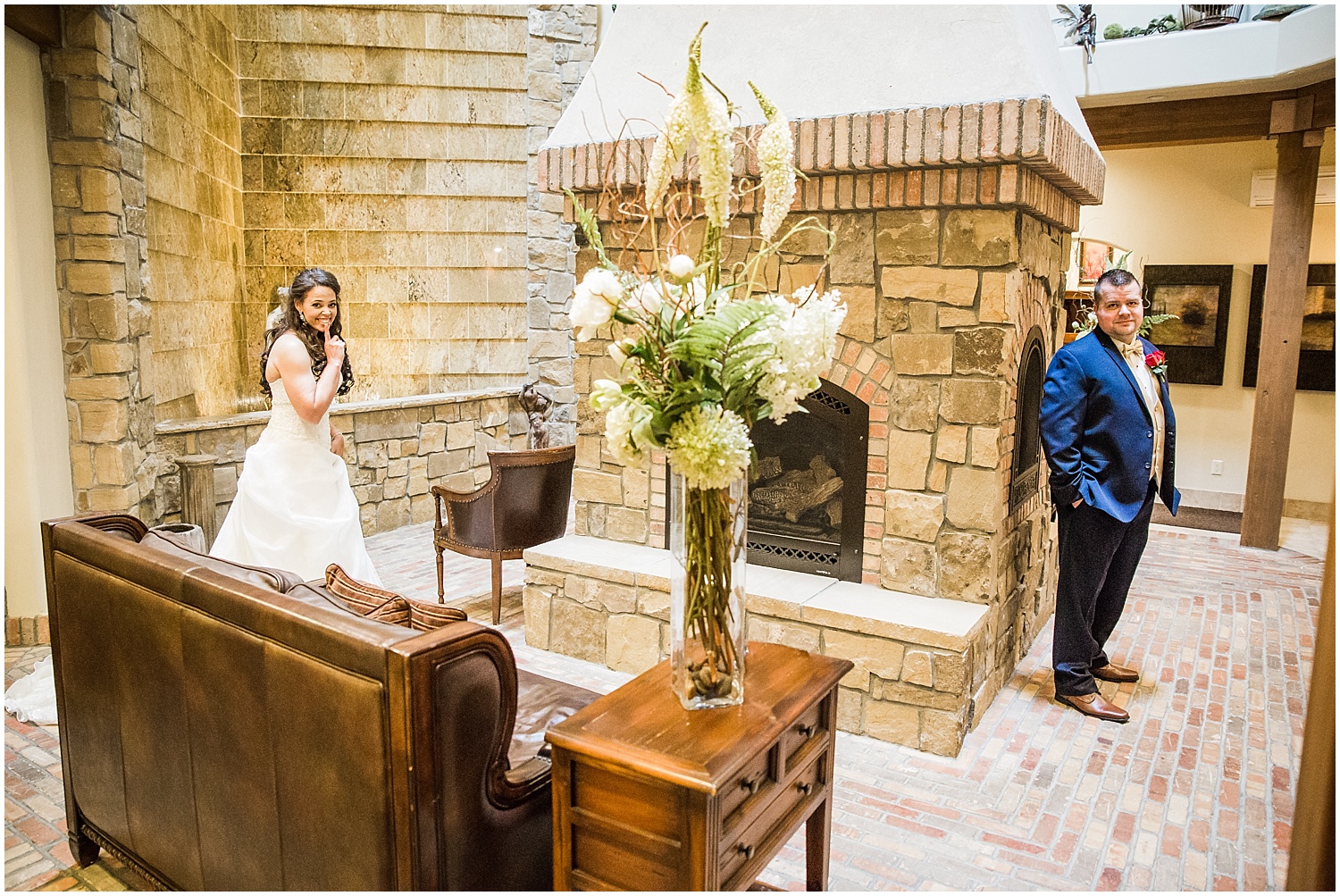 bride doing her indoor first look with groom at Della Terra in Estes Park 