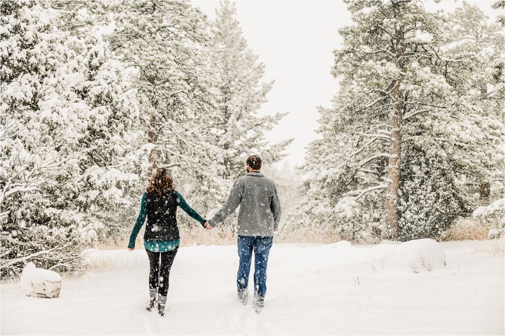 Winter Engagement Photos, Mount Falcon Park, Colorado Photographer, snow, snowy portraits, yellow lab, dog photo, engaged, portrait photographer, save the date, engaged, Morrison Colorado, wedding photographer, red rocks, mountain engagement photos, she said yes, winter boots, snowy hair, diamond ring