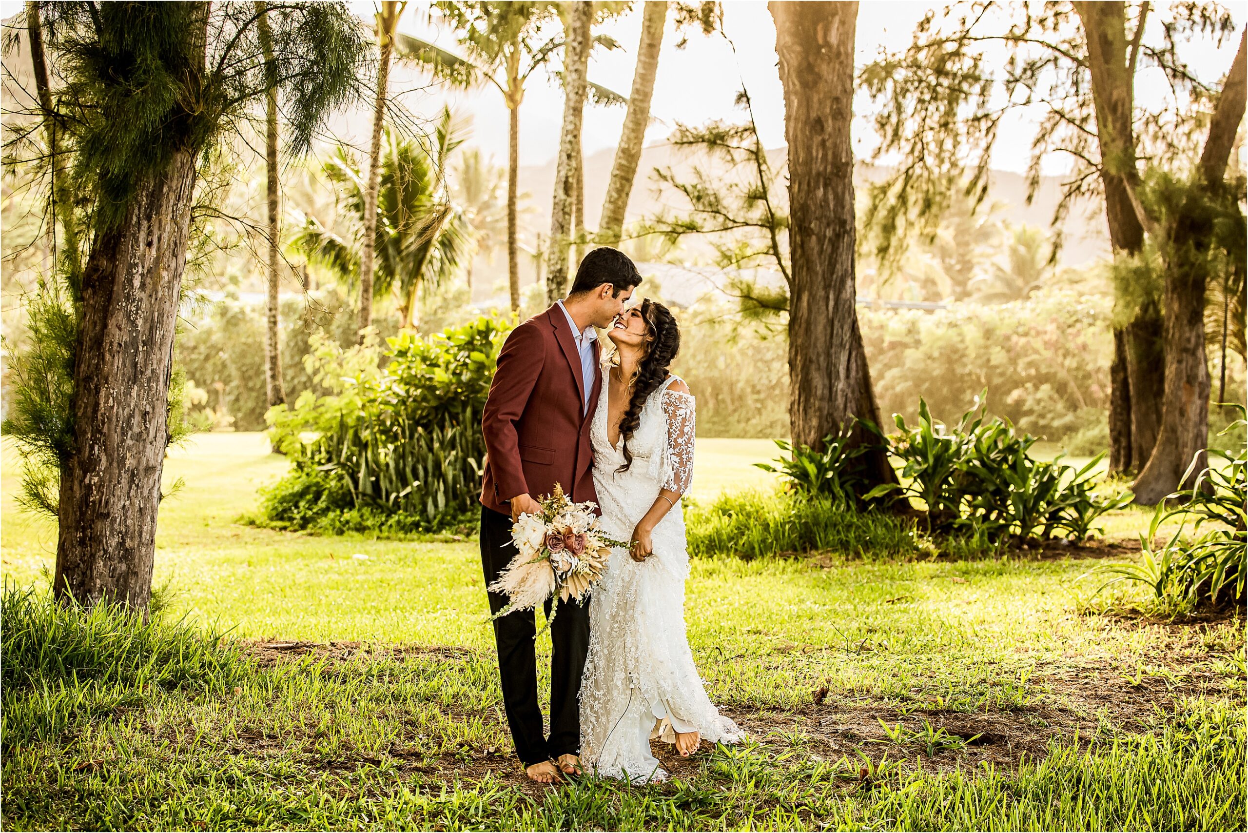 Wedding elopement photography of Golden hour in the palm trees of Kauai with bride and groom