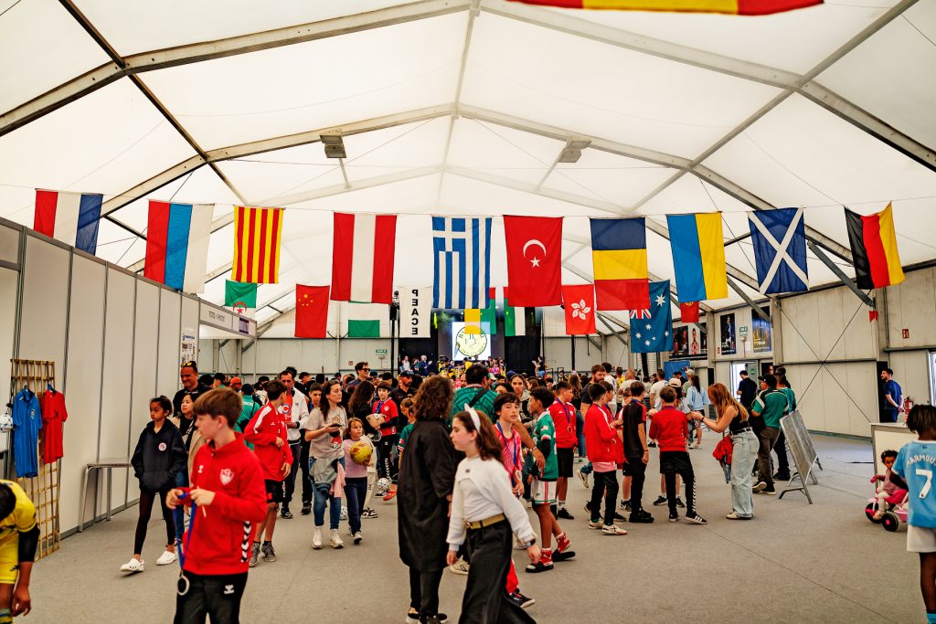 world flags displayed at the mundialito soccer tournament in spain 